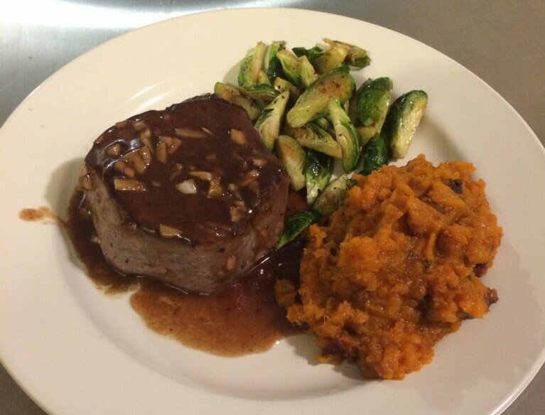 Fillet with Brussels sprouts, prepared by Father Jason Doke.